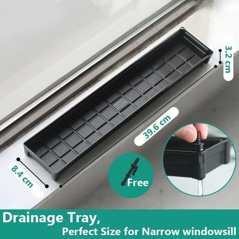 Black plastic drainage tray with grid pattern cells, long rectangular shape for planters.