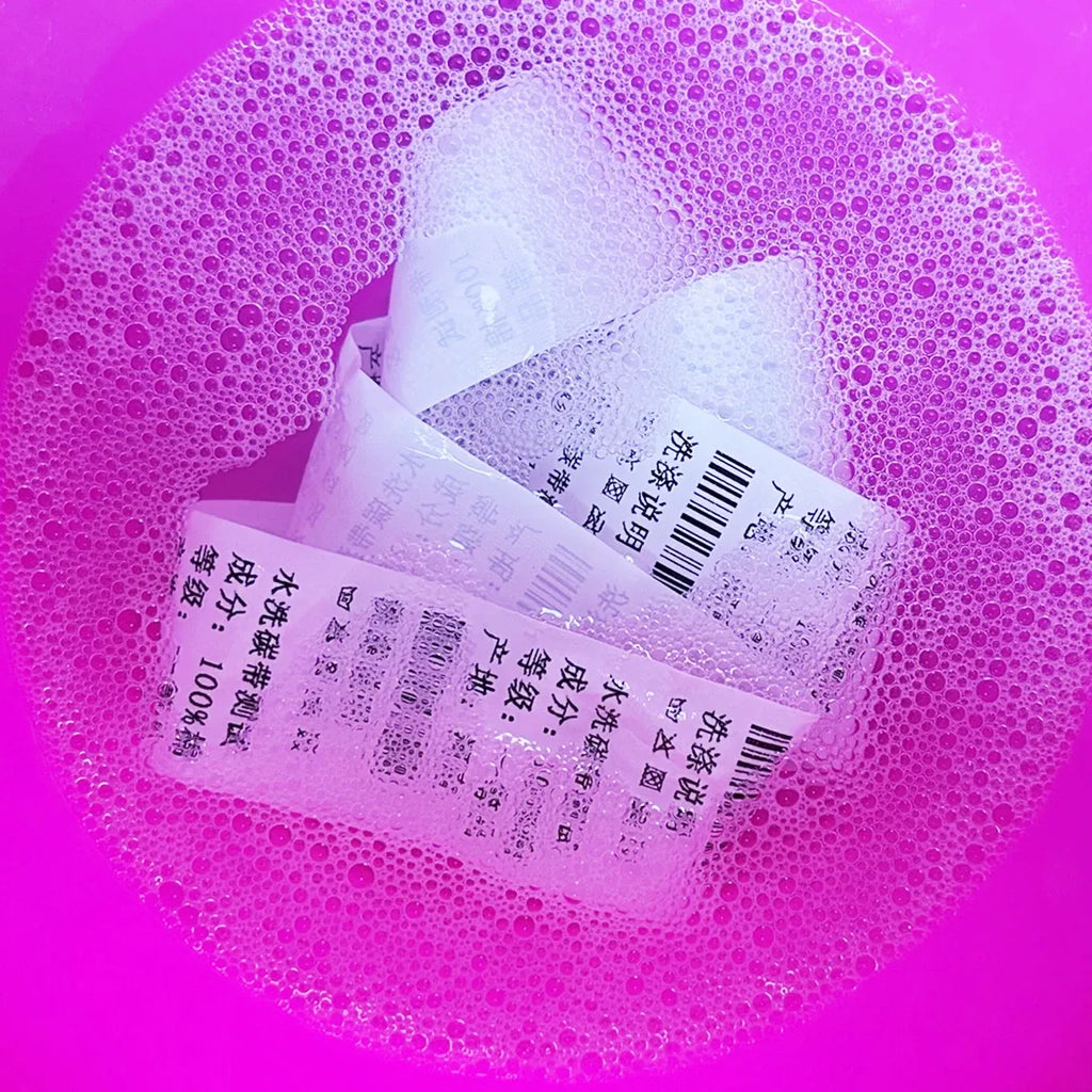 Enhanced wash/resin thermal transfer ribbon strips with barcode label