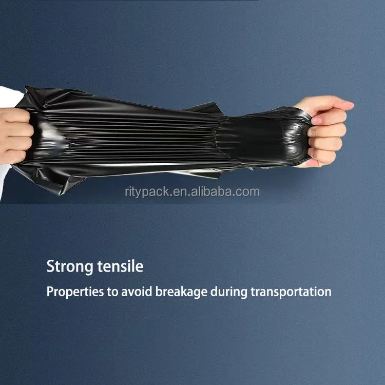 Black poly mailer shipping bag with self-seal opening, held by hands