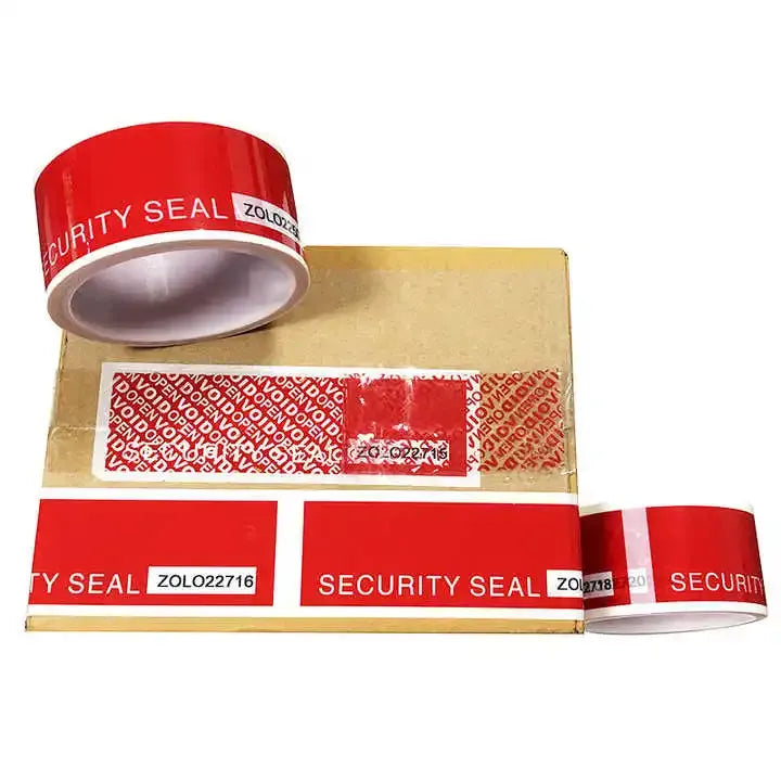 Red security seal carton sealing tape, applied across cardboard with VOID pattern