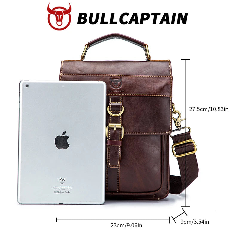 BULLCAPTAIN vintage brown genuine leather messenger bag with handle, adjustable strap, and buckle detail. Trunks.