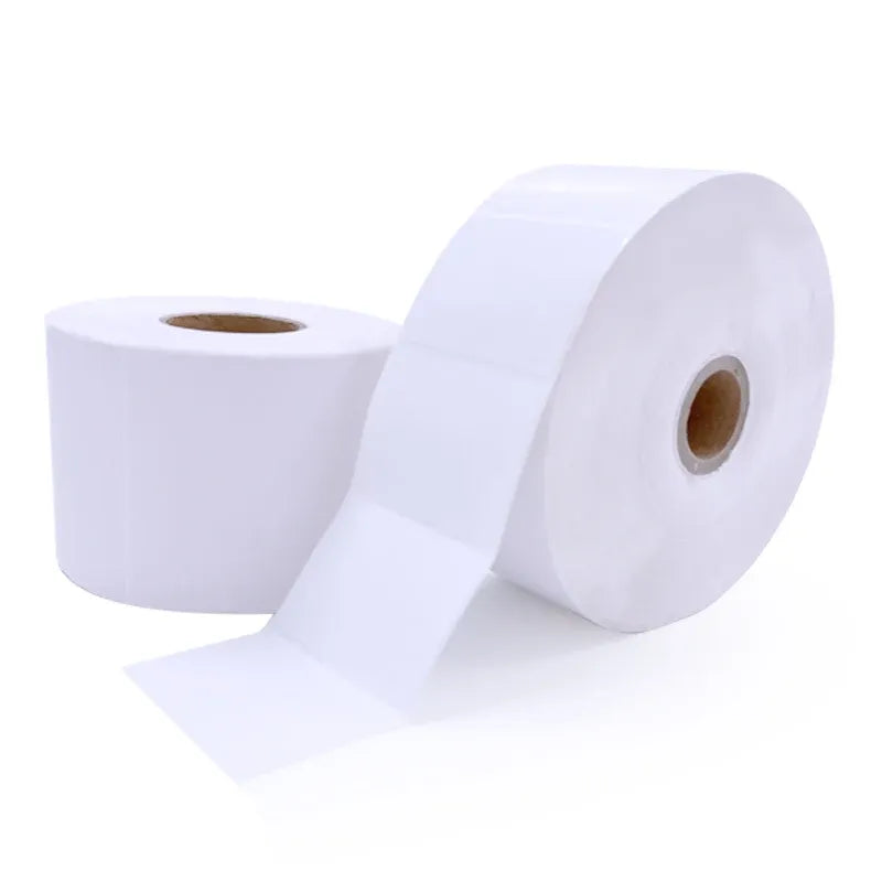 White thermal label jumbo roll with unspooled labels and core visible