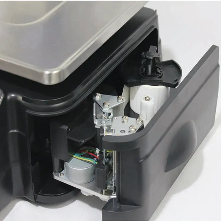 Label printing scale interior with metal mechanism, wiring, and print components