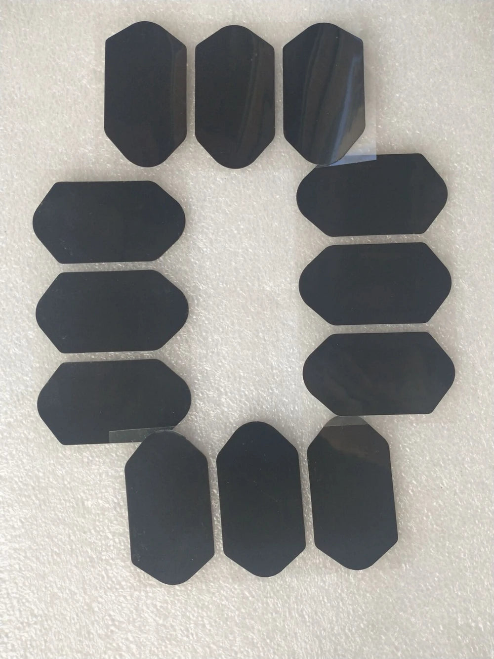 Set of 10 black replacement film stickers for 3D 4D HIFU beauty machine cartridges, hexagonal shape, adhesive labels.