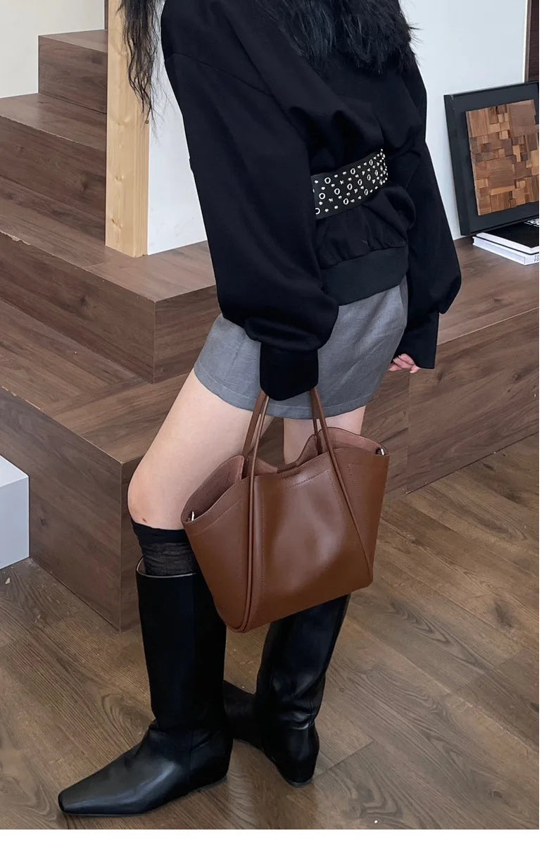 2025 Autumn Winter High-End Niche Genuine Leather Wing Bag Large Capacity Commuter Shoulder Promotional Drawstring Sportpacks