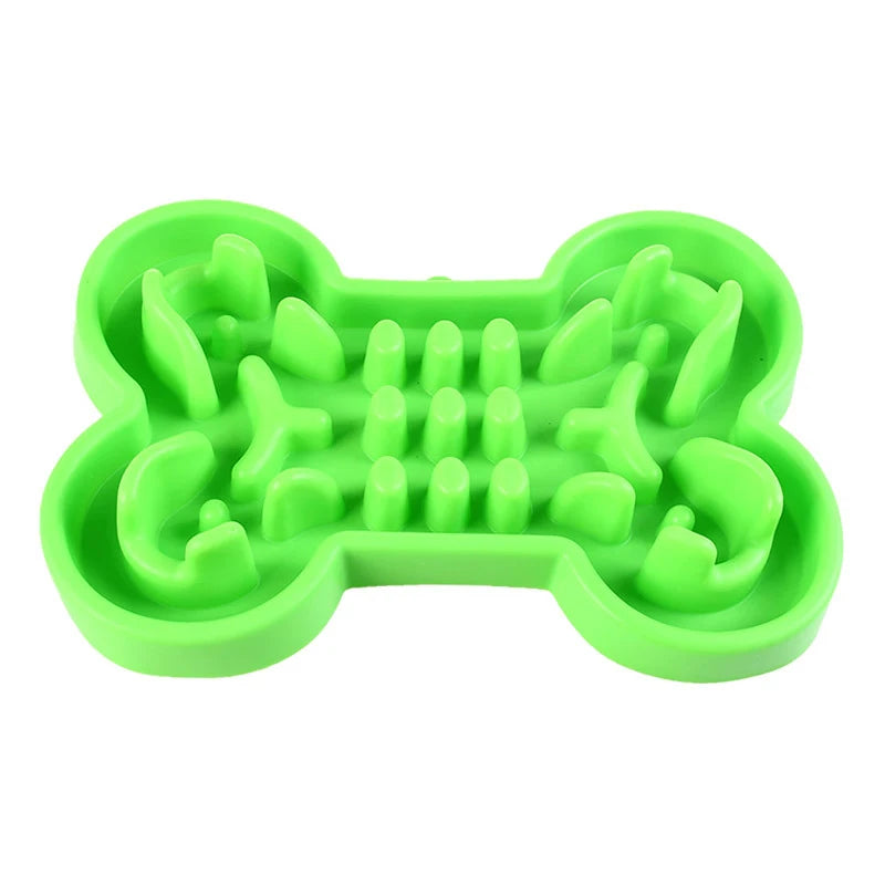 Green bone-shaped soft rubber slow feeder bowl for dogs and cats to prevent gulping and aid healthy digestion.