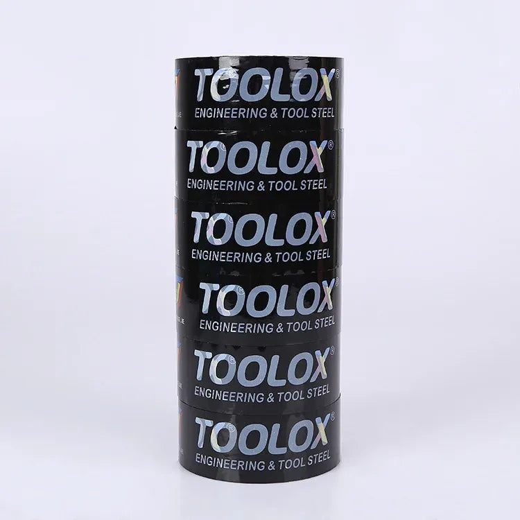 Black printed packing tape roll with TOOLox engineering and tool steel text