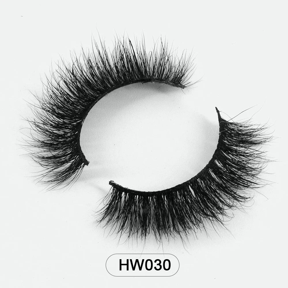 A pair of black 3D mink false eyelashes with a soft, flexible band, displayed against a white background. Model: HW030.