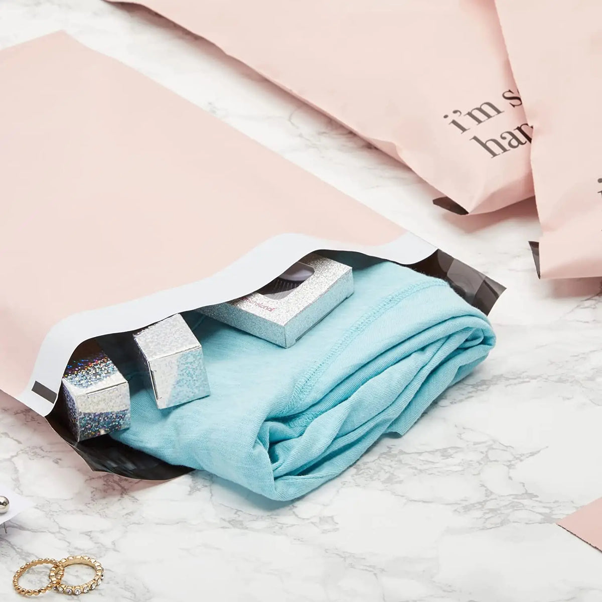 Light blue clothing inside reinforced self-adhesive handle packaging bag