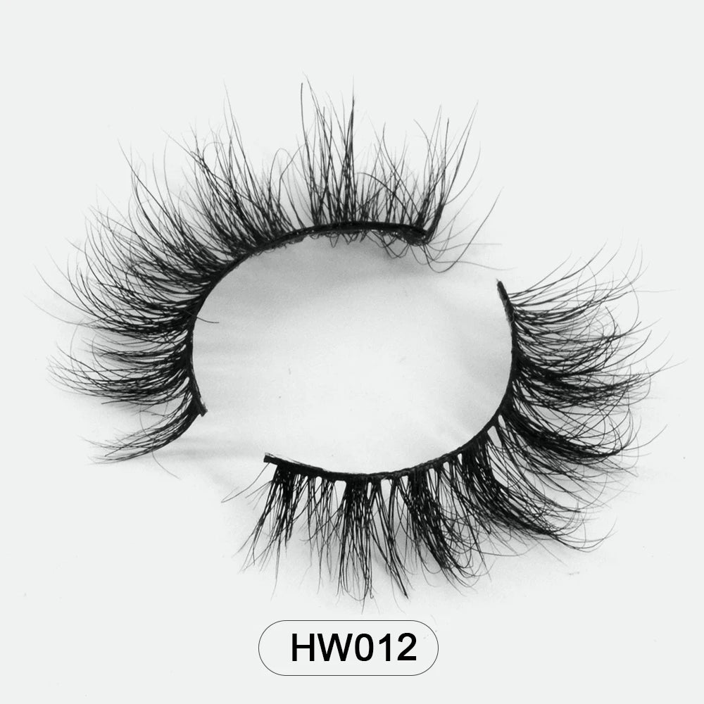 Fluffy black 3D mink false eyelashes with a flexible band on a white background, labeled HW012.