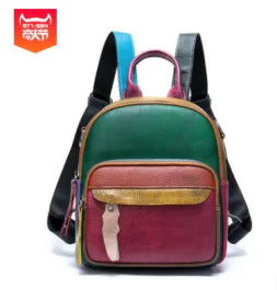 Color-blocked designer leather women's backpack handbag with top handle and multi-colored shoulder straps.