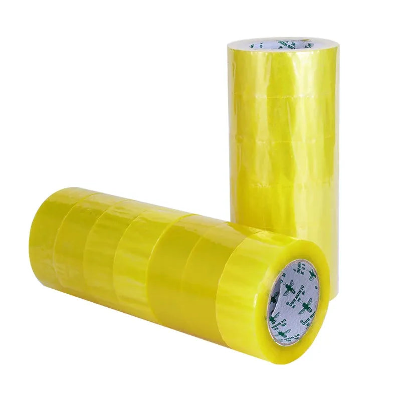 Yellow packing tape roll with another roll lying horizontally