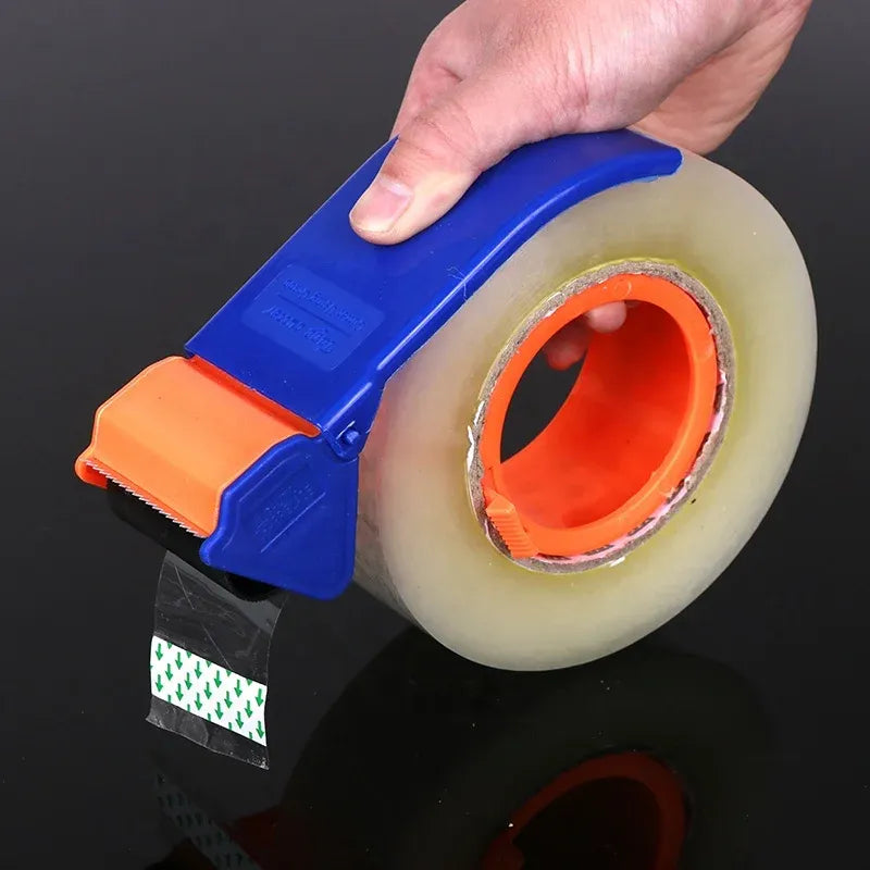 Hand holding yellow packing tape roll with blue dispenser and printed inner core