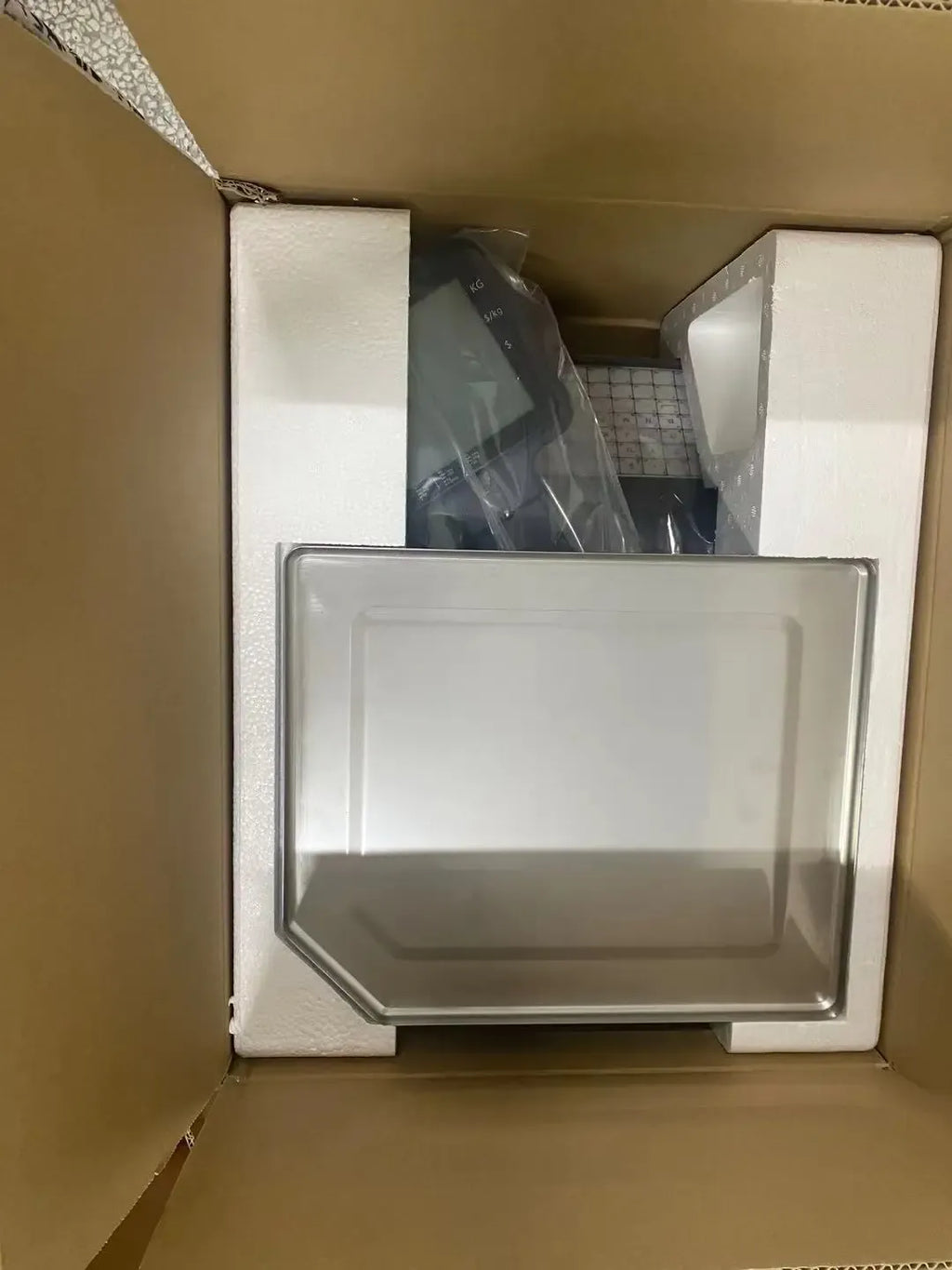 Thermal label printer scale packed in shipping box with protective inserts