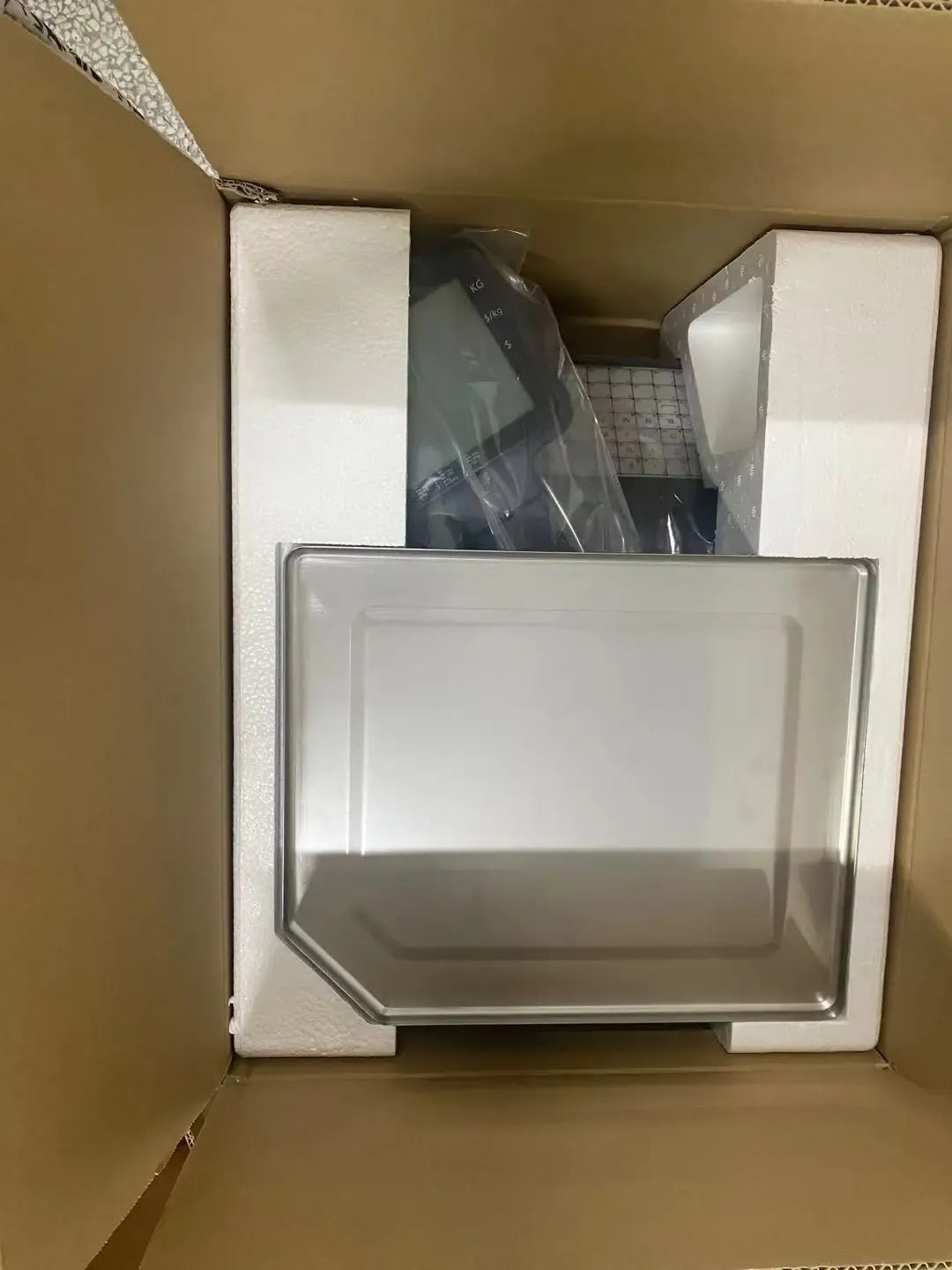 Thermal label printer scale packed in shipping box with protective inserts