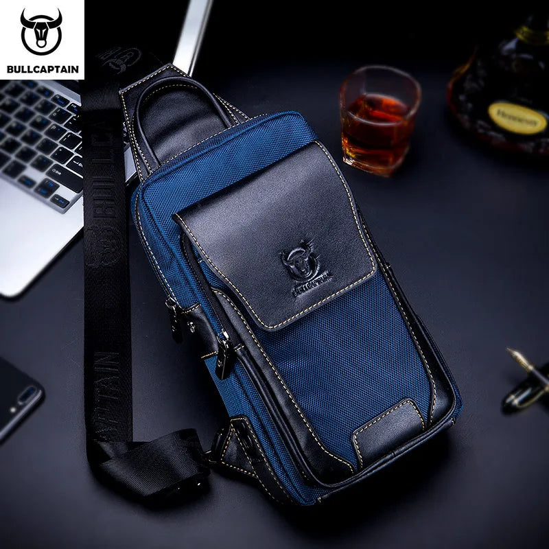 BULLCAPTAIN blue canvas and leather crossbody chest bag with adjustable branded strap for men.
