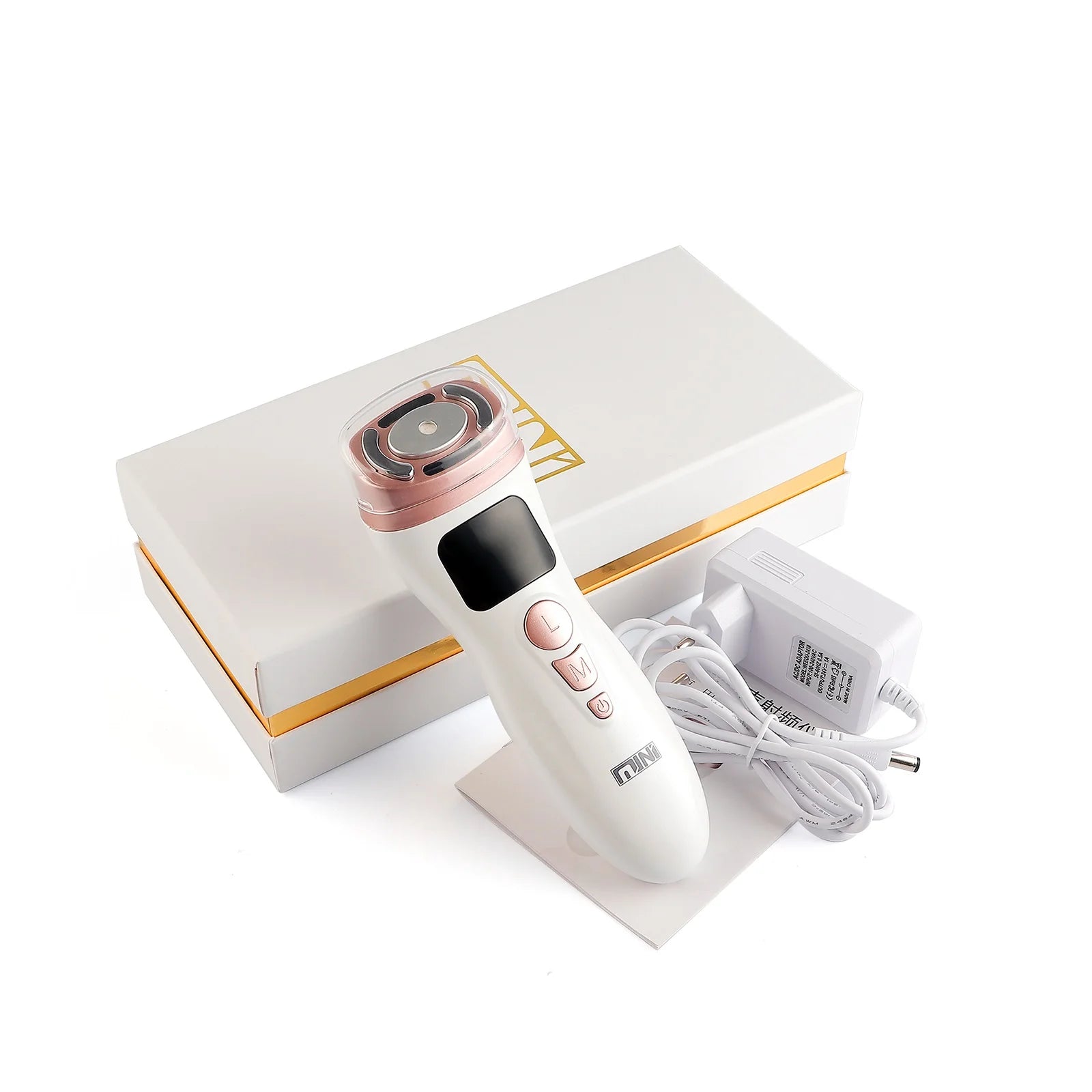 White and rose gold handheld HIFU facial tightening device with a power adapter and white box.
