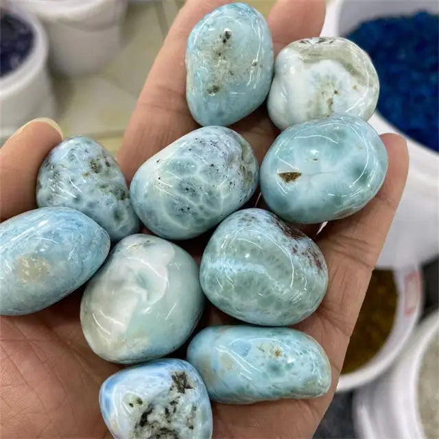 Sky blue tumbled larimar gemstone stones, rounded with natural veining and specks