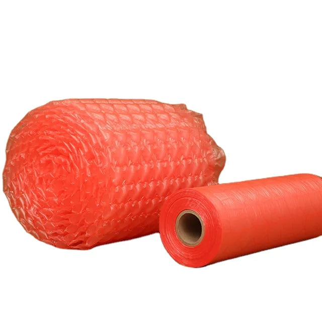 Pink bubble wrap sheet with rolled edge and refill roll, protective cushioning