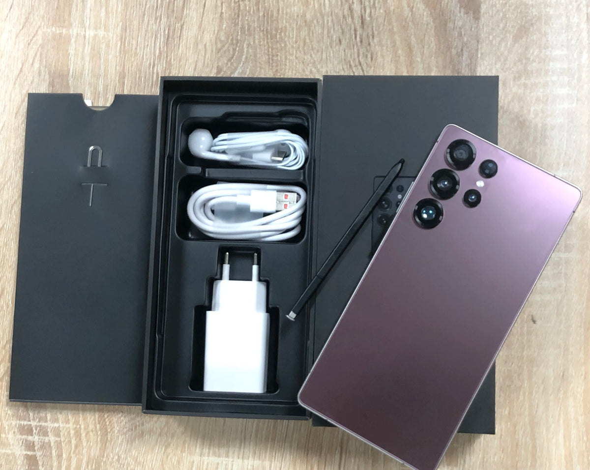 Purple smartphone with open retail box, charging cable, and wall adapter