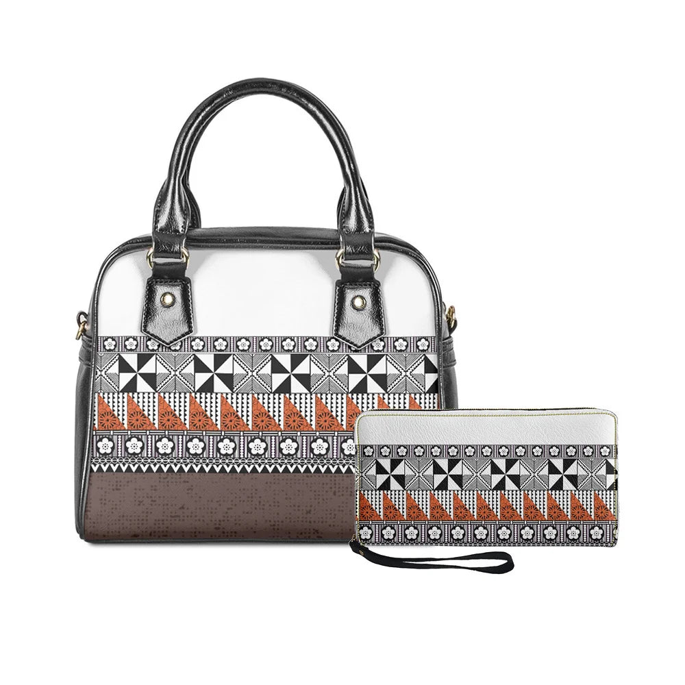 Polynesian tribal handbag and wallet set with black, white, and orange geometric floral patterns in faux leather.
