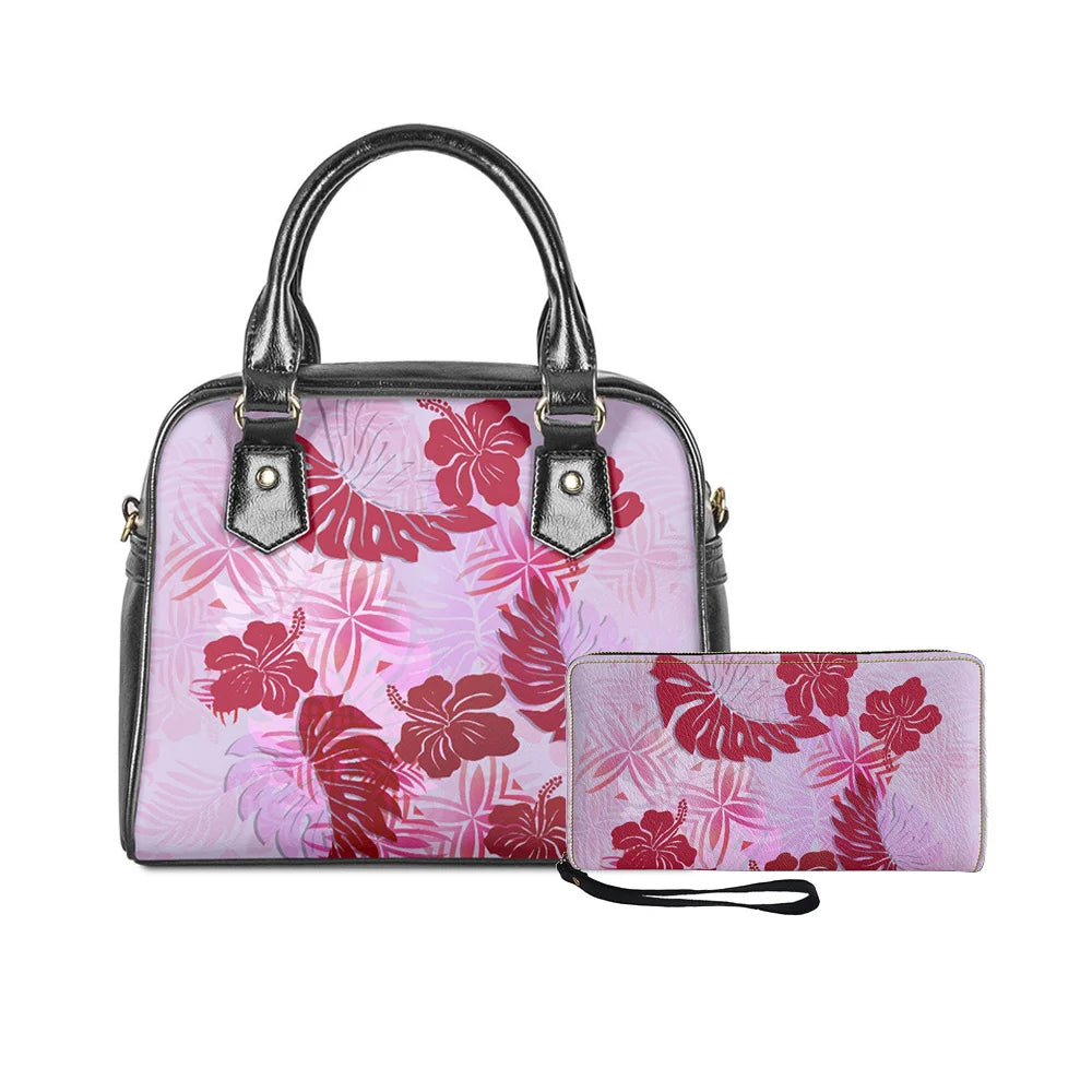 2-piece handbag and wallet set in pink Hawaiian tribal print with black leather-style accents and monster leaves.