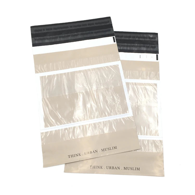 Cream plastic poly mailer bags with black seal strip and "THINK URBAN MUSLIM" branding