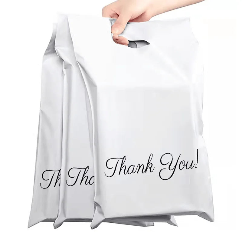 White handle mailer bag with 'Thank You!' print on the front