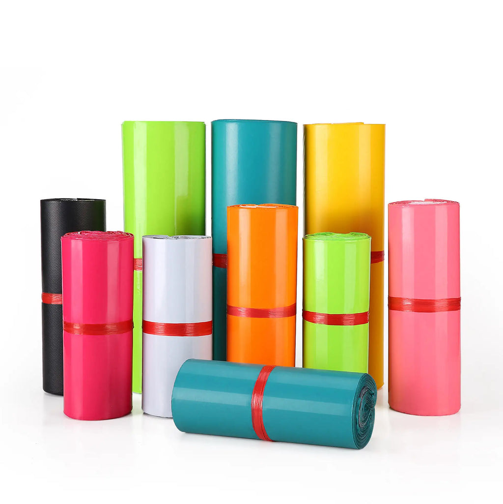 Bright waterproof poly mailer bag rolls in neon green, teal, yellow, orange, pink, black