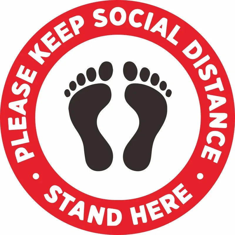 Red circular floor decal sticker with footprints and text: keep social distance, stand here