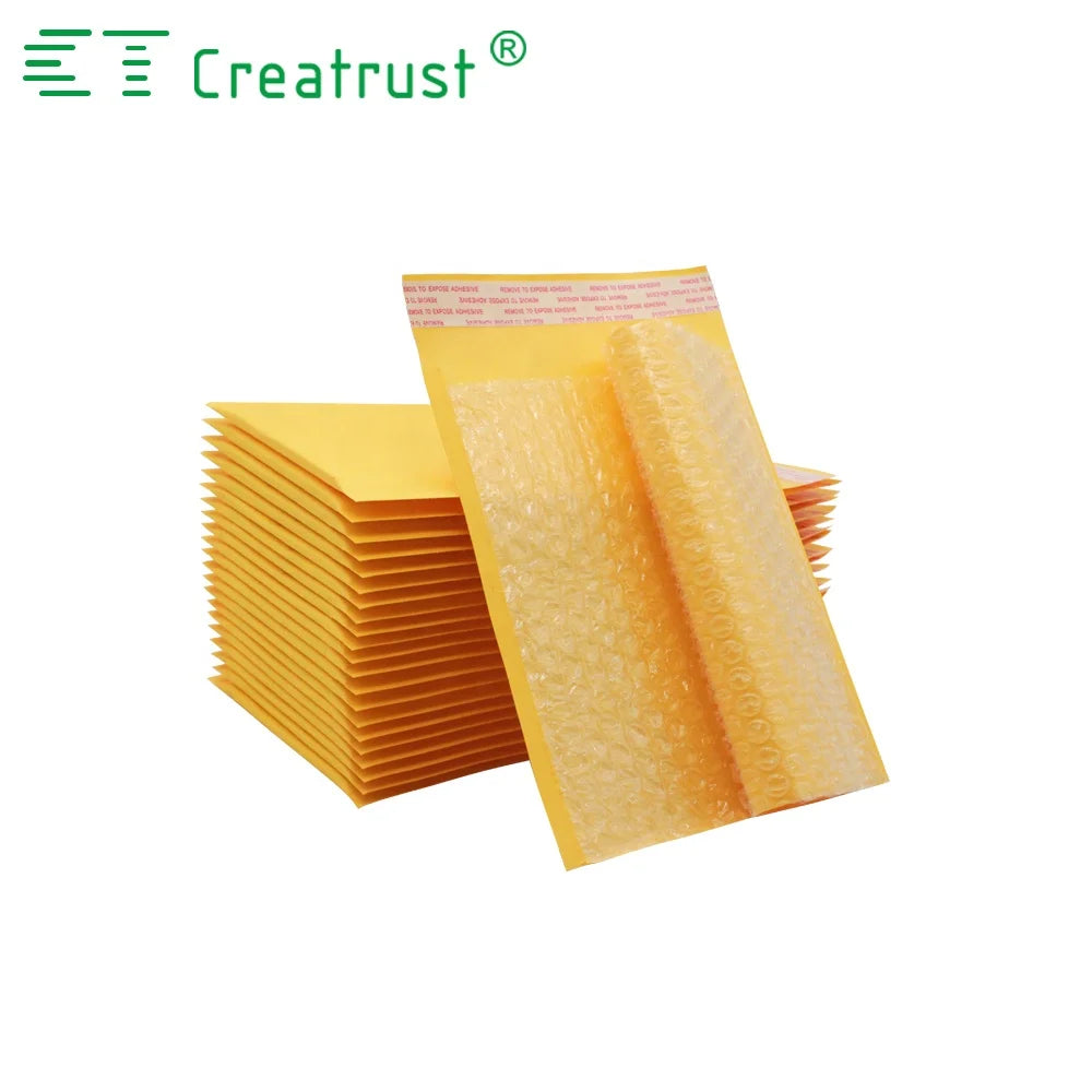 Yellow padded mailer with textured bubble wrap and printed shipping label strip