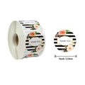 Roll of round thank you stickers with roses and black-and-white striped accents