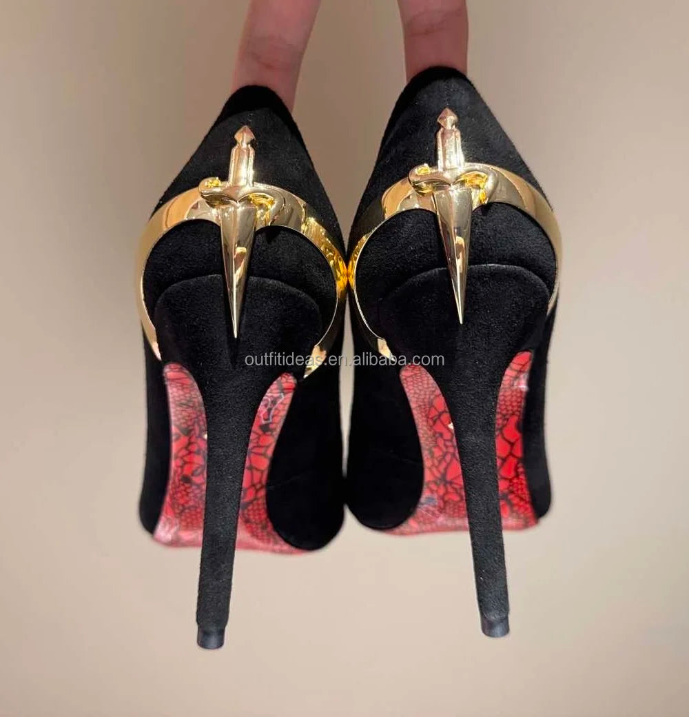 Luxury black suede stiletto heels with gold dagger detail and red lace soles, perfect for formal evening wear.