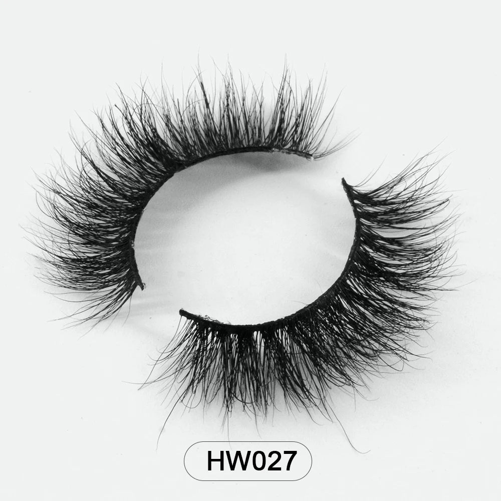 A pair of fluffy black 3D mink false eyelashes with a flexible band, labeled HW027, centered on a white background.