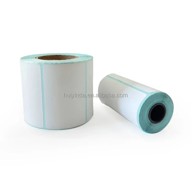 Thermal label roll on teal-toned core, white labels with teal edge borders