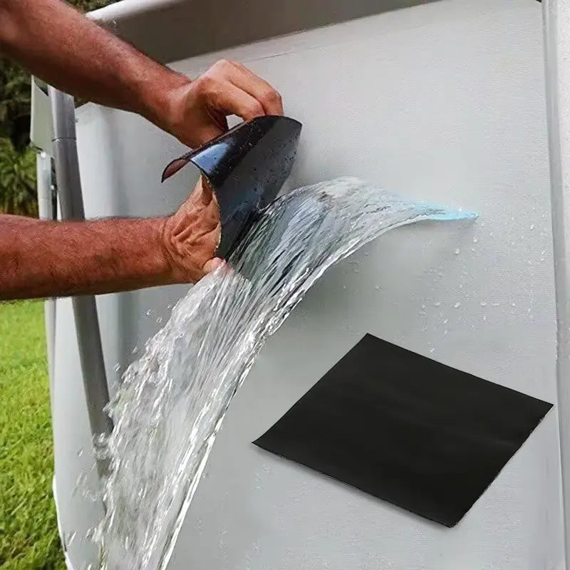Waterproof sealing tape applied around a pipe joint with water spray