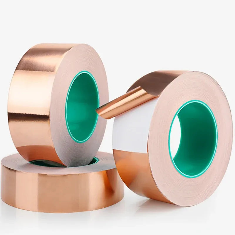 Copper foil tape roll with adhesive backing, two rolls shown for electrical use