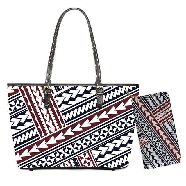 2pc leather handbag and wallet set in red, navy, and white with traditional Polynesian tribal trunk pattern.