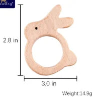 Natural wood bunny teething ring for baby. Eco-friendly light beige teething toy for infants.