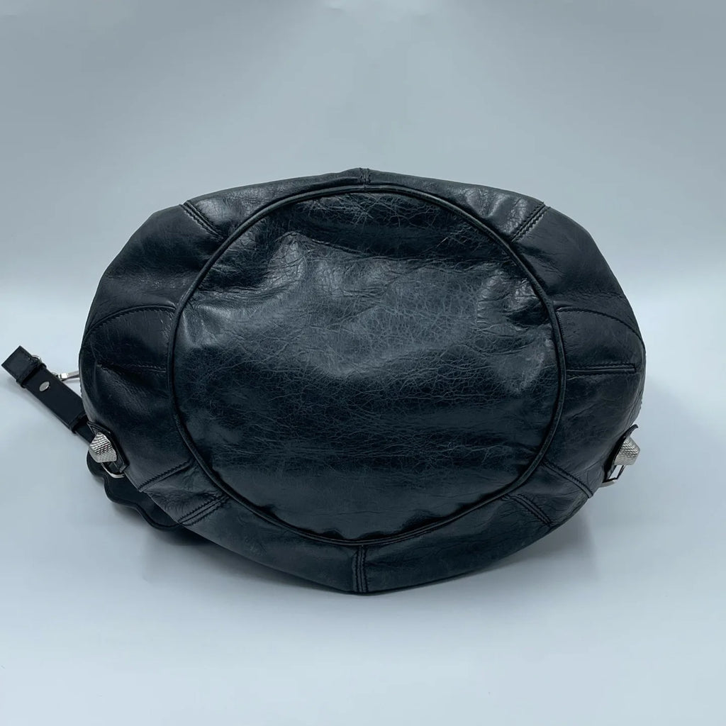 Luxury Pre-Owned Designer Leather Bucket Bag with Chic Metal Studs and Adjustable Shoulder Strap