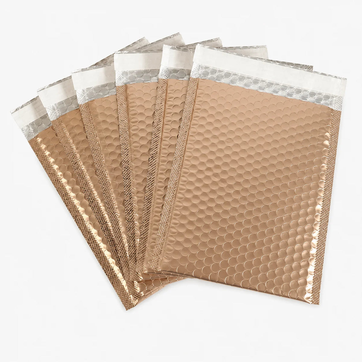 Metallic bubble mailer bags in tan and silver with crinkled padded texture