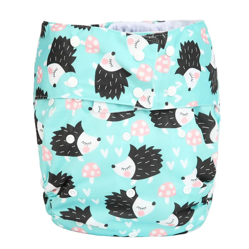 Reusable cloth baby diaper with hedgehog and mushroom print on teal background, adjustable snap buttons.
