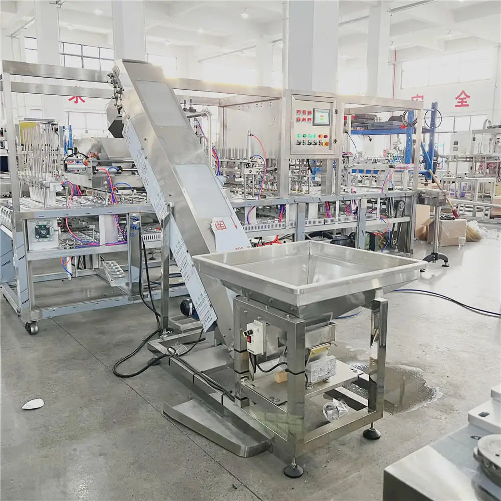 Stainless Steel Automatic Bucket Elevator Conveyor for Ice Cubes & Grain Paper/Plastic Packaging 380V/220V Easy Operation