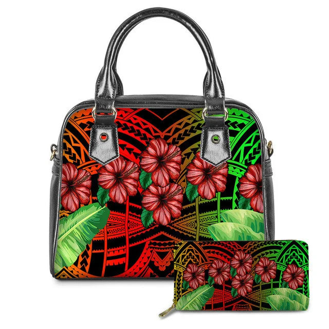 Polynesian tribal print leather handbag and wallet set with colorful plumeria flowers and red, orange, and green hues.