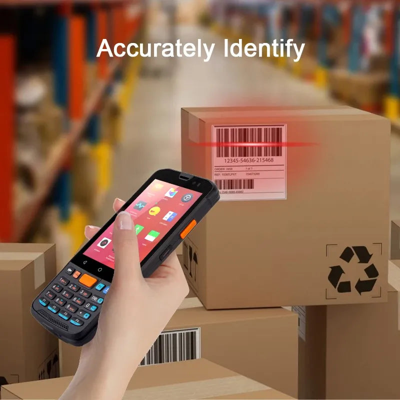 Black rugged PDA in hand scanning a barcode on a shipping box