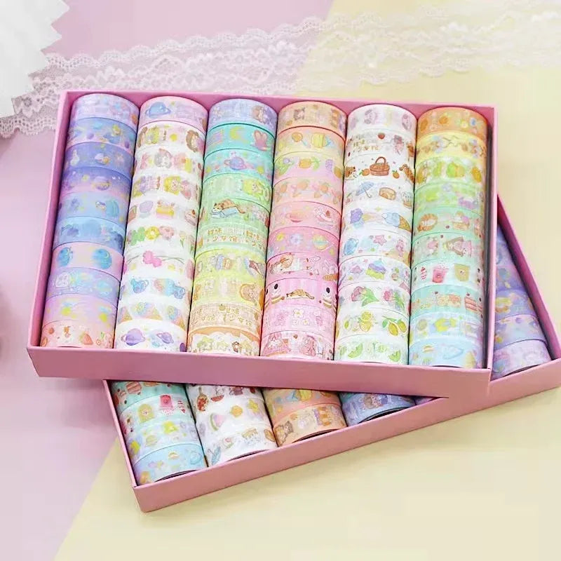 Washi tape set in a box showing multiple pastel patterned rolls
