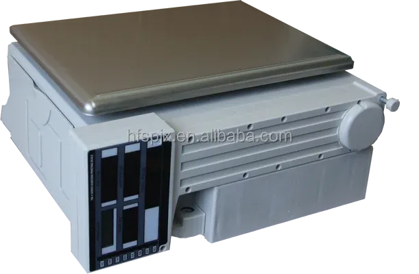 Tabletop electronic weighing scale with stainless weighing platform and side housing controls.