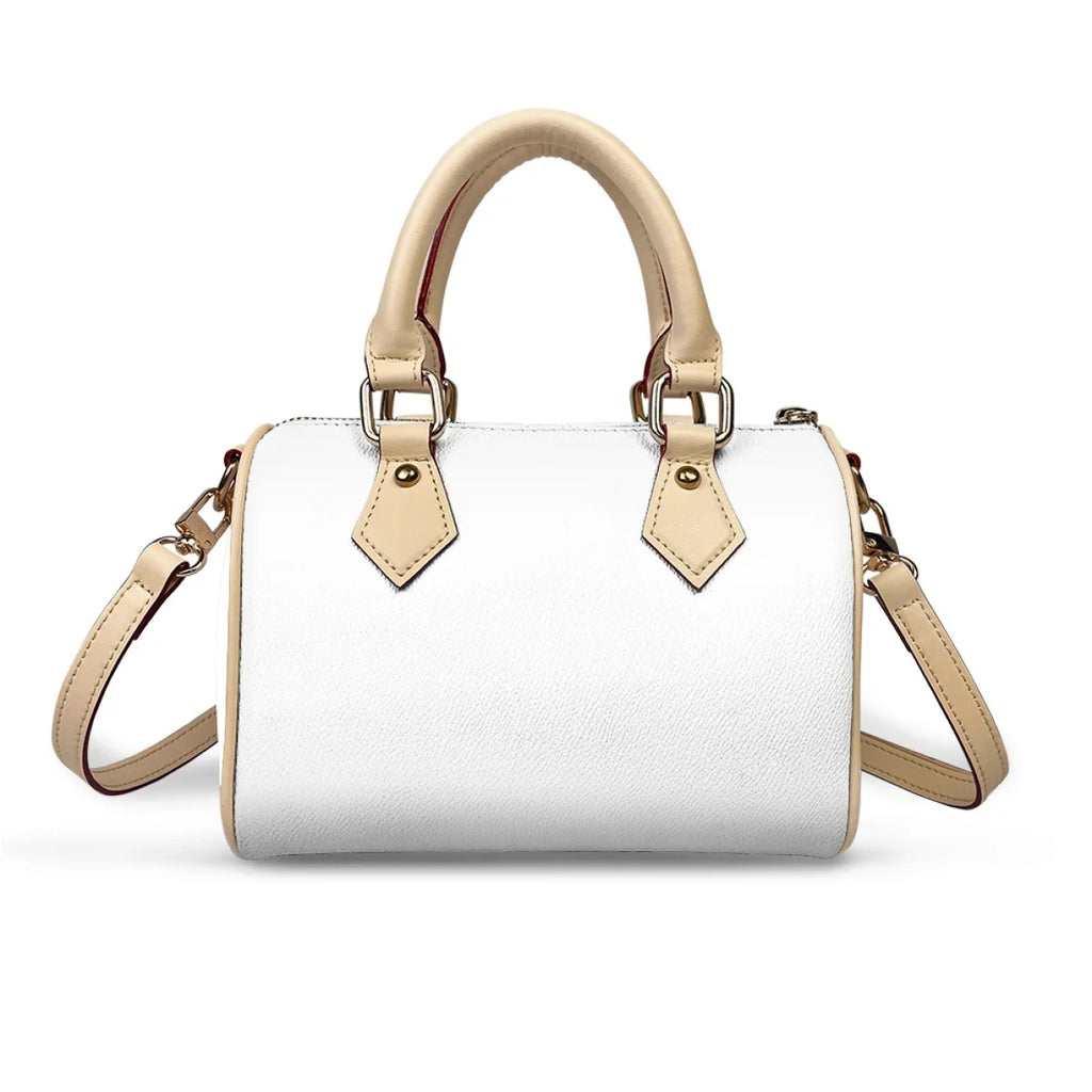 White PU leather trunk handbag with beige handles, detachable cross-body strap, zip closure, and gold hardware.