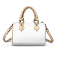 White PU leather trunk handbag with beige handles, detachable cross-body strap, zip closure, and gold hardware.