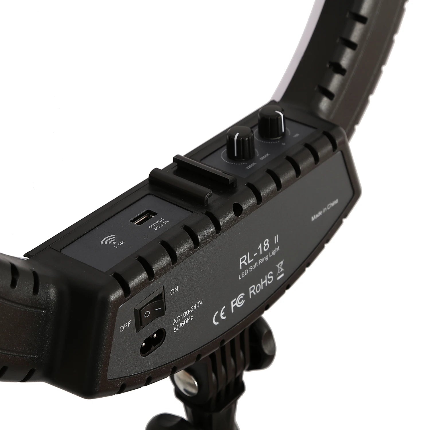 Black RL-18 II LED ring light control panel with two adjustment knobs, power switch, and USB output port.